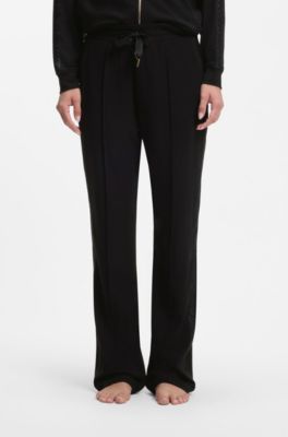 Tracksuit bottoms in stretch modal with monogram tape, Black