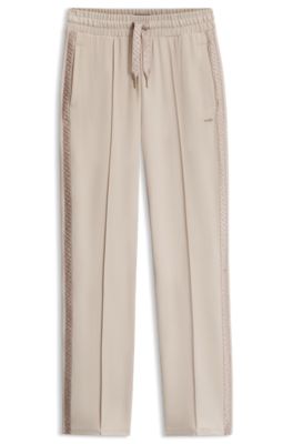 Tracksuit bottoms in stretch modal with monogram tape, Light Beige