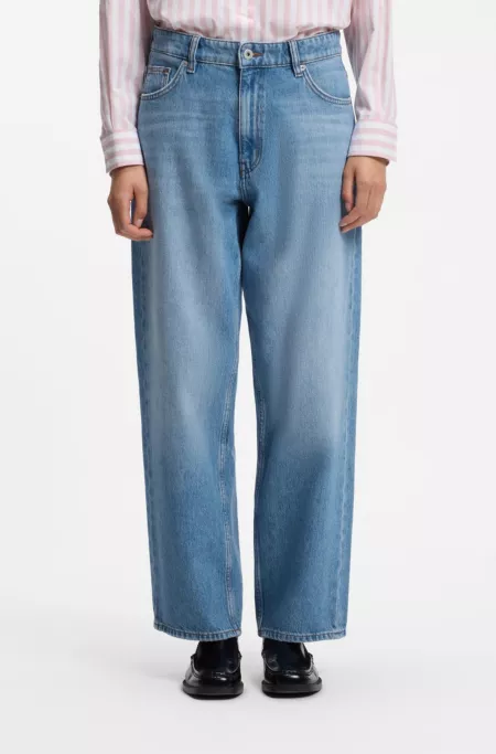 Loose-fit wide-leg jeans with charm accents
