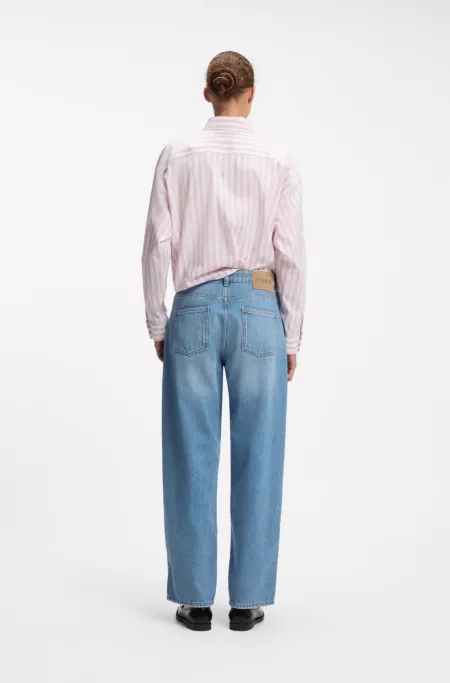 Loose-fit wide-leg jeans with charm accents
