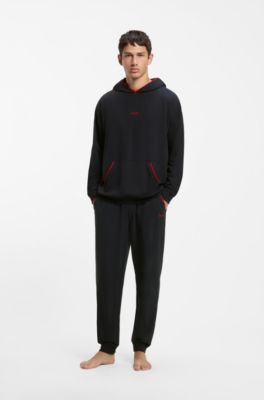 Cotton-blend cuffed tracksuit bottoms with logo piping, Black