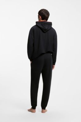 Cotton-blend cuffed tracksuit bottoms with logo piping, Black