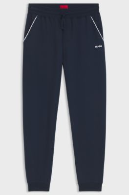 Cotton-blend cuffed tracksuit bottoms with logo piping, Dark Blue