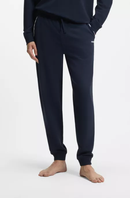 Cotton-blend cuffed tracksuit bottoms with logo piping