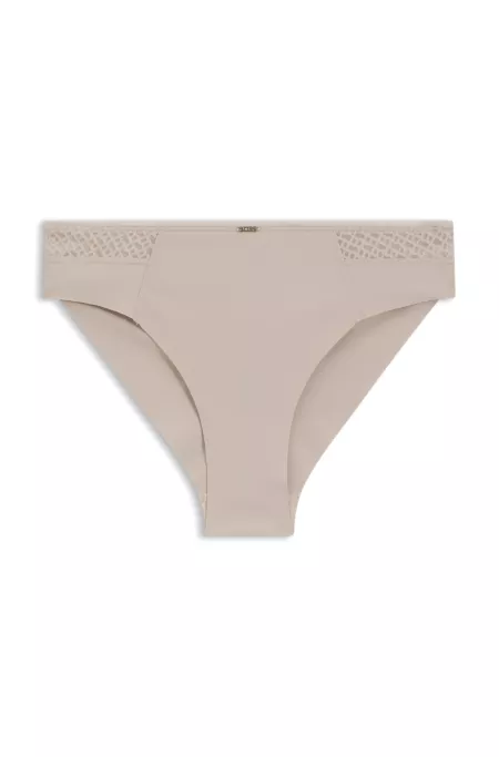 Slip taille basse avec plaquette dorée et dentelle monogramme