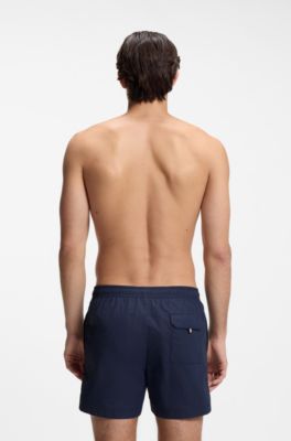 Badeshorts mit Allover-Monogramm-Print, Dunkelblau