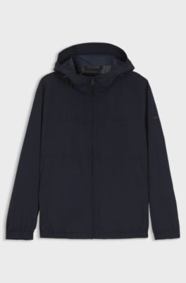 Giubbotto con cappuccio relaxed fit in tessuto idrorepellente, Blu scuro