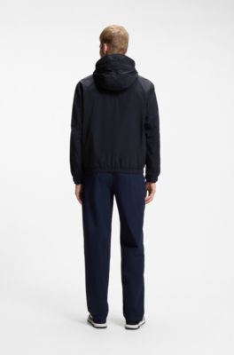 Giubbotto con cappuccio relaxed fit in tessuto idrorepellente, Blu scuro