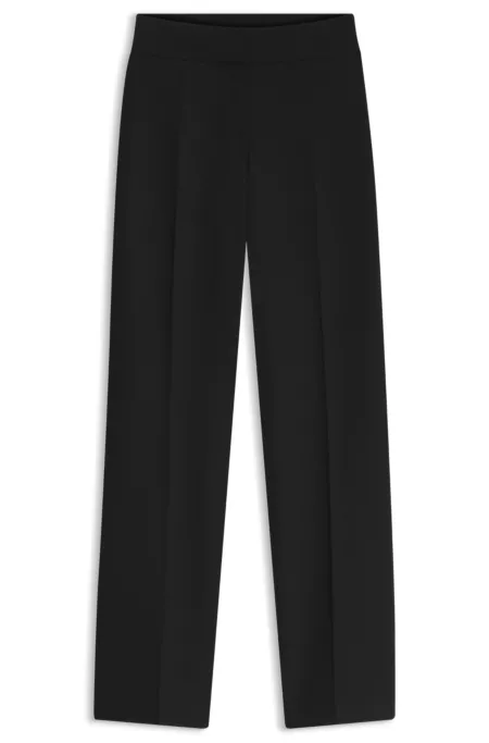 Pantalones de pernera ancha en tejido elástico