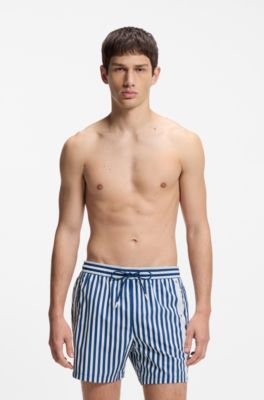 Randiga badshorts med vertikal logga, Bl&aring;