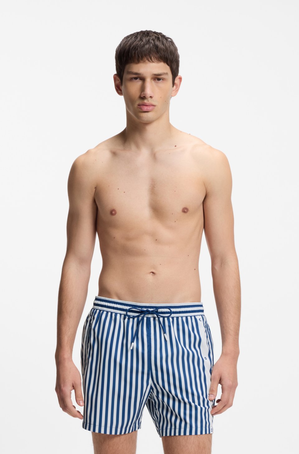 Striped swim shorts with vertical logo