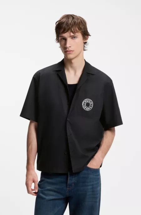 Relaxed-fit shirt with chest print and reverse lapels