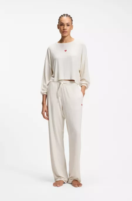 Pantalones de chándal de modal elástico con logo de corazón