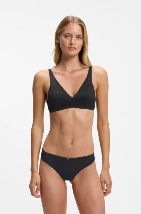 Slip taille basse en dentelle avec touches d'or