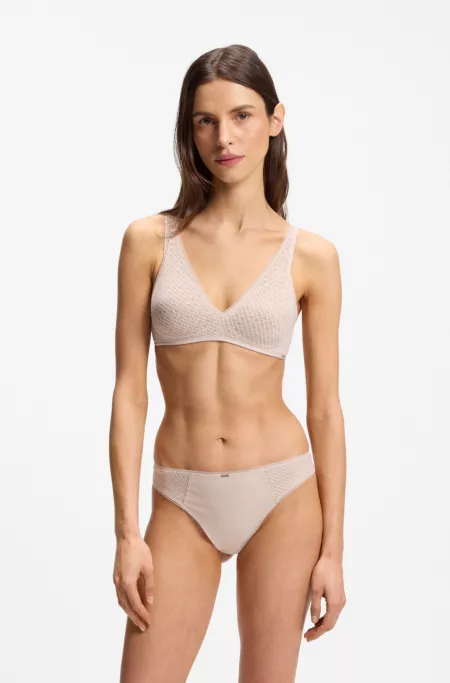 Low-rise briefs with lace and gold accents