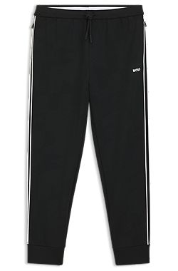 Triangle-jacquard tracksuit bottoms with rubberised logo