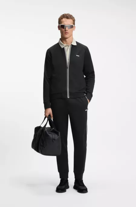 Triangle-jacquard tracksuit bottoms with rubberised logo