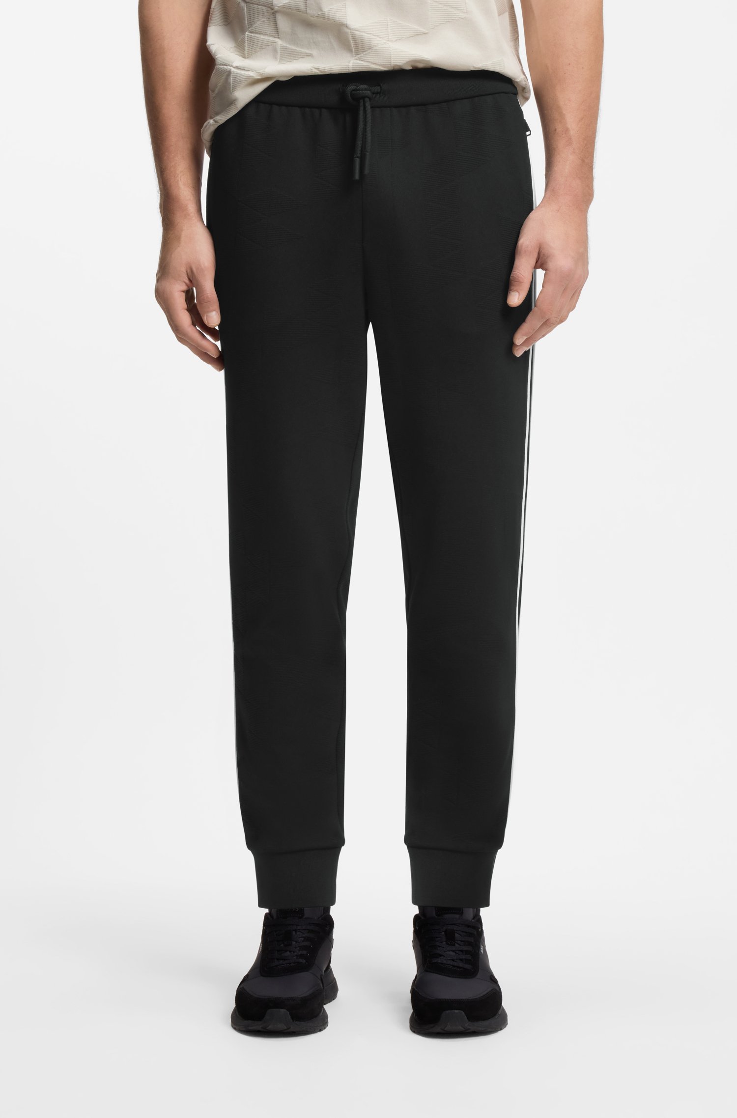 Boss Triangle-jacquard tracksuit bottoms with rubberised logo byxor herr