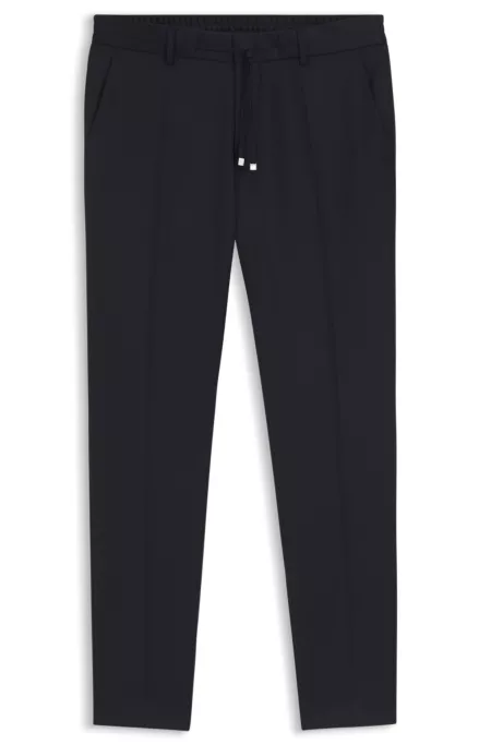 Pantalones slim fit de sarga de lana virgen