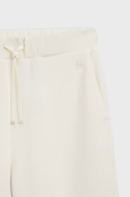 Relaxed-fit broek van dubbellaagse scuba jersey met taps toelopende pijpen, Wit