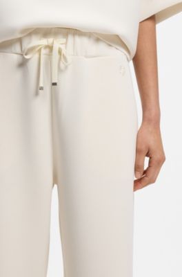 Relaxed-fit broek van dubbellaagse scuba jersey met taps toelopende pijpen, Wit