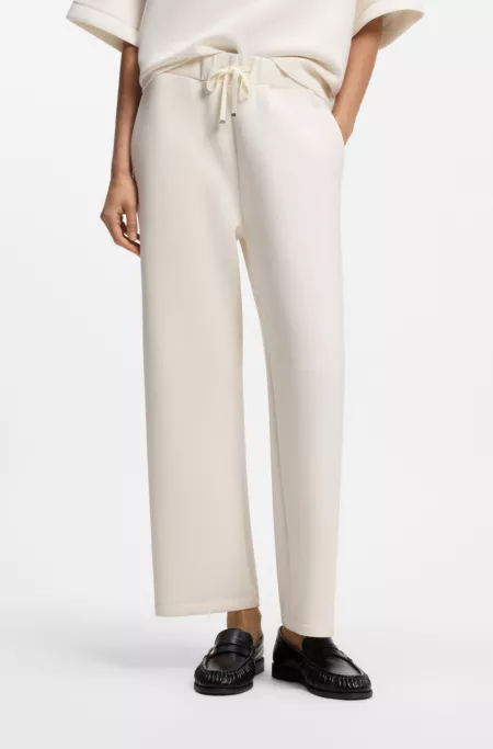 Relaxed-fit barrel-leg trousers in double-layer scuba jersey