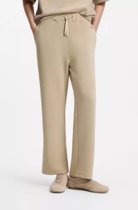 Pantalones relaxed fit de pernera tipo barrel en punto de buzo de doble capa