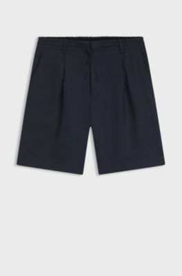 Bermuda con fit affusolato in lino, Blu scuro