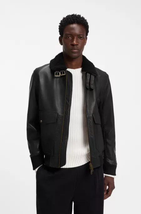Veste en cuir matelassée avec détails en peau lainée