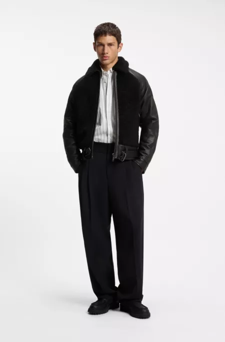 Belted leather jacket with shearling panels