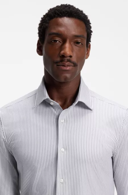 Camisa slim fit en punto de algodón con rayas