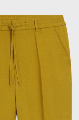 Pantaloni fit affusolato con vita con coulisse, Oro
