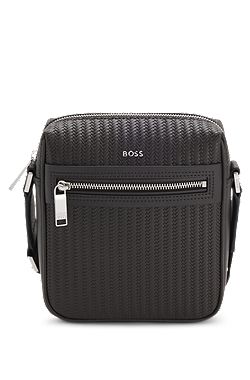 Reporter bag with embossed pattern