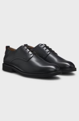 Scarpe derby in pelle con logo goffrato, Nero