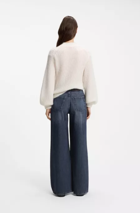 Jeans aus blauem Denim mit weitem Beinverlauf und Bundfalten auf der Vorderseite