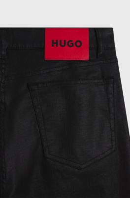 Slim-fit black jeans in coated comfort-stretch denim, Black