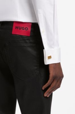 Slim-fit black jeans in coated comfort-stretch denim, Black