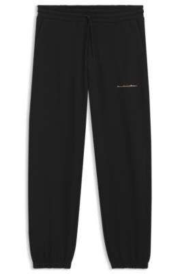 Hugo Relaxed-fit cotton trousers with streetwear logo casual byxor herr – bild 4