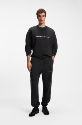 Hugo Relaxed-fit cotton trousers with streetwear logo casual byxor herr – bild 2