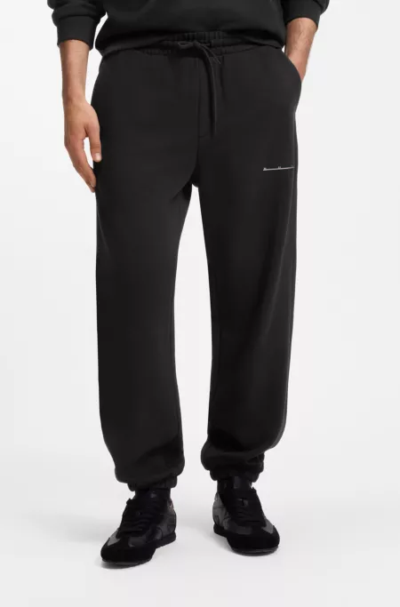 Relaxed-fit cotton trousers with streetwear logo