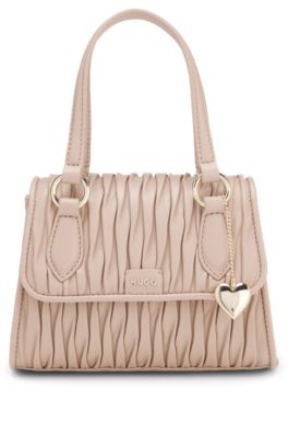 Faux-leather handbag with heart charm, light pink
