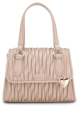 Faux-leather handbag with heart charm 1