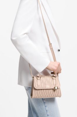 Faux-leather handbag with heart charm, light pink