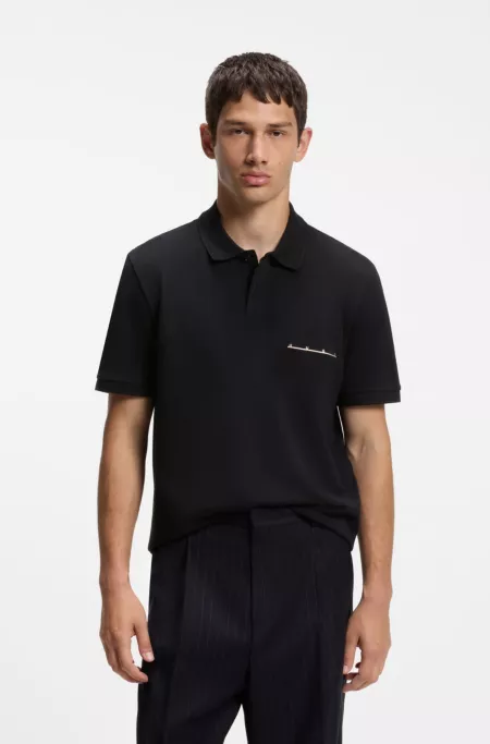 Polo shirt in cotton piqué with logo detail
