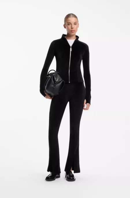 Pantalon évasé en velours stretch avec fentes sur le devant