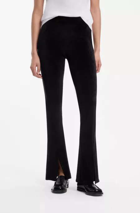 Pantalon évasé en velours stretch avec fentes sur le devant