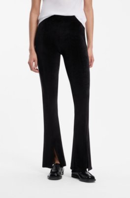 Stretch-velvet flared-fit trousers with front slits