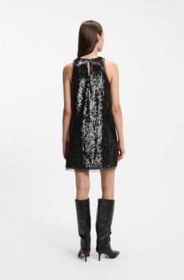 Sequin-covered mini dress with sheer trims