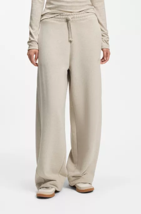 Relaxed-fit barrel-leg trousers in melange jersey