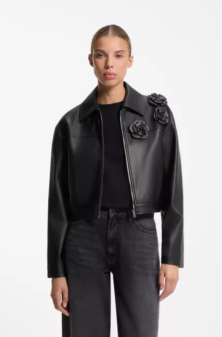 Veste en similicuir avec ornements à fleurs